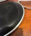 Aluminium retaining strip for mesh drum heads